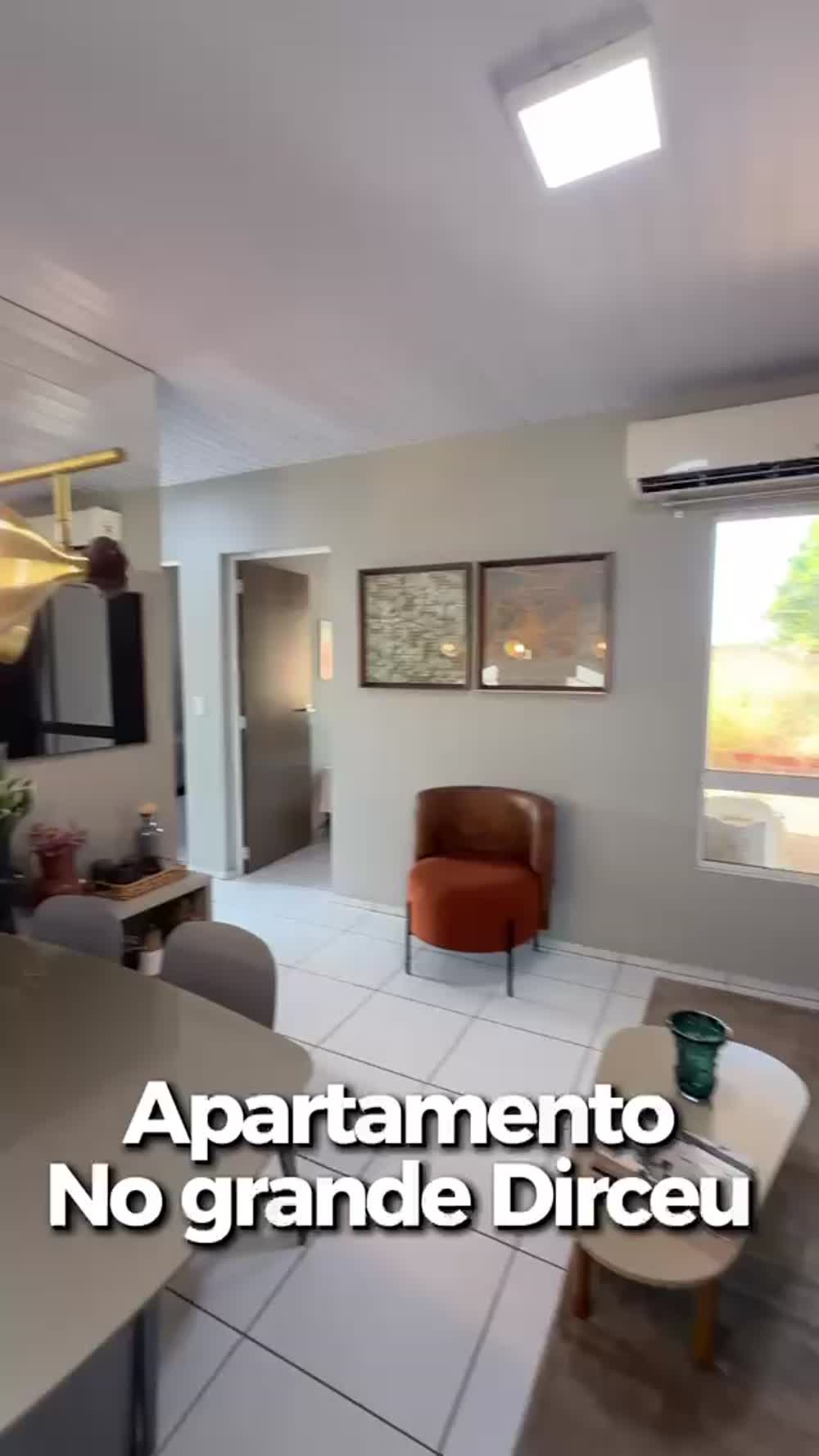 Sala de apartamento apresentado no material da Realiza